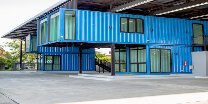 Modern blue shipping container home.