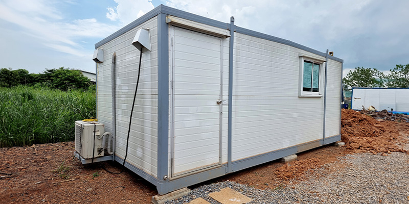 container-home-ventilation Modern container house featuring visible ventilation systems.