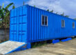A blue prefabricated container building, demonstrating modern, portable ablution block solution.